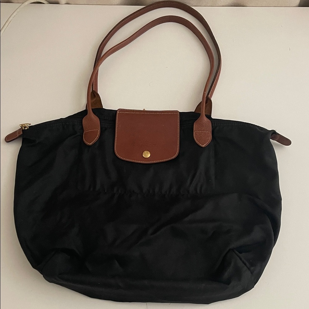 Longchamp Black Tote with Brown Accents missing insert fabric.